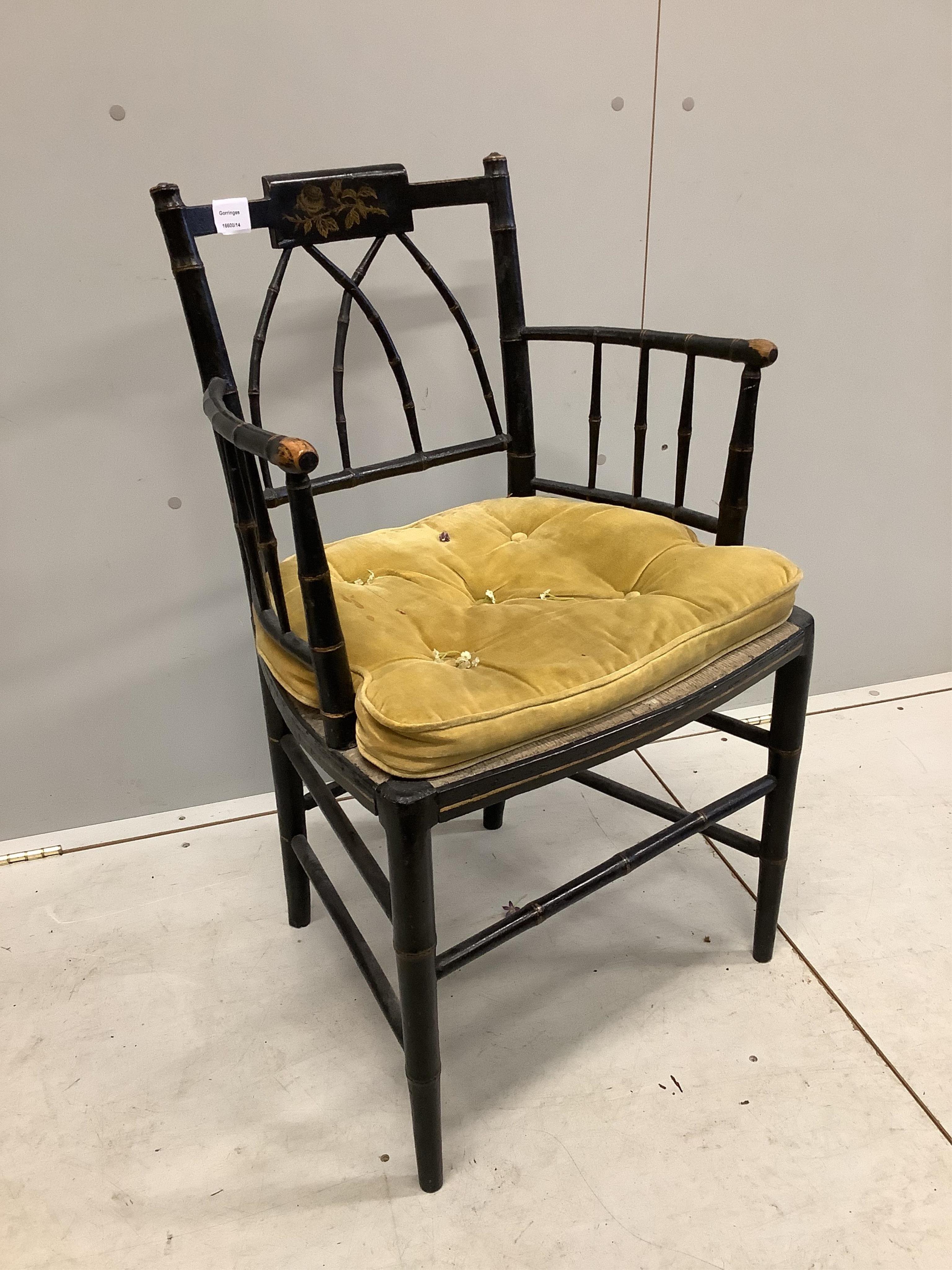 A Regency painted faux bamboo elbow chair, width 52cm, depth 41cm, height 85cm. Condition - fair